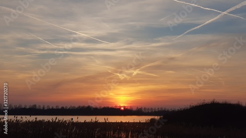 Sunset over the lake in Hoofddorp photo