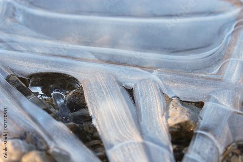 Frozen ice crystal at lake closeup