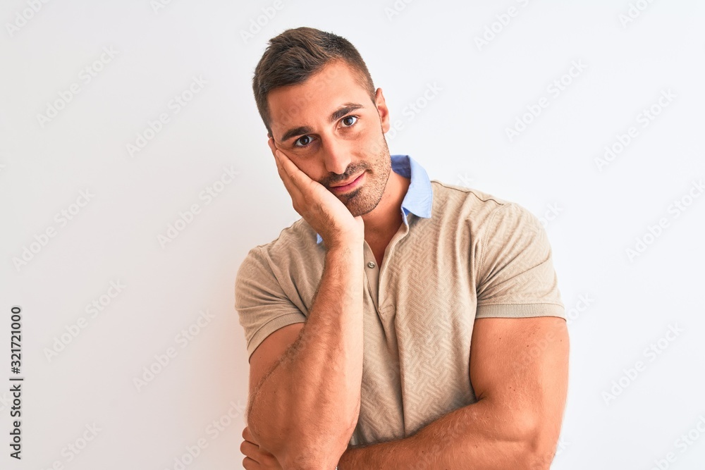 Young handsome man wearing elegant t-shirt over isolated background thinking looking tired and bored with depression problems with crossed arms. Young handsome man wearing elegant t-shirt over isolated background thinking looking tired and bored with depression problems with crossed arms.