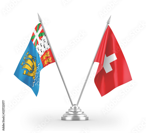 Switzerland and Saint Pierre and Miquelon table flags isolated on white 3D rendering photo