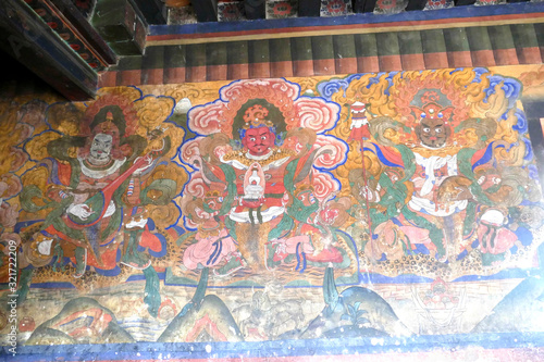 Guardian Lord deity fresco  Jambay Lhakhang Temple photo