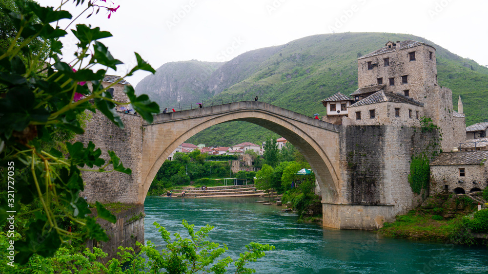 Mostar, Bosnia and Herzegovina, April 2019: Old bridge in Mostar on a cold day.
