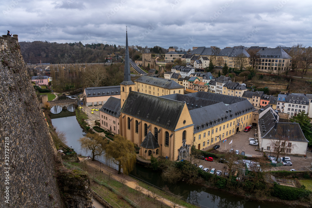 View of a monastery along the river Alzette in the city of Luxembourg.