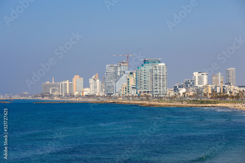 Tel Aviv coastline, the hotel area from a low point of view. View of Tel Aviv coastline From Jaffa Port.  © MagioreStockStudio