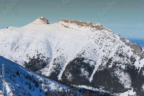 Fototapeta Naklejka Na Ścianę i Meble -  Winter view to Giewont in Tatra mountains in Zakopane,Poland