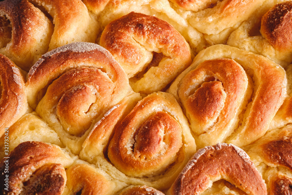 Sweet tasty homemade Rose buns rolls with sugar hot and fresh, bakery for recipe book, top view macro texture Sweet tasty homemade Rose buns rolls with sugar hot and fresh, bakery for recipe book, top view macro texture