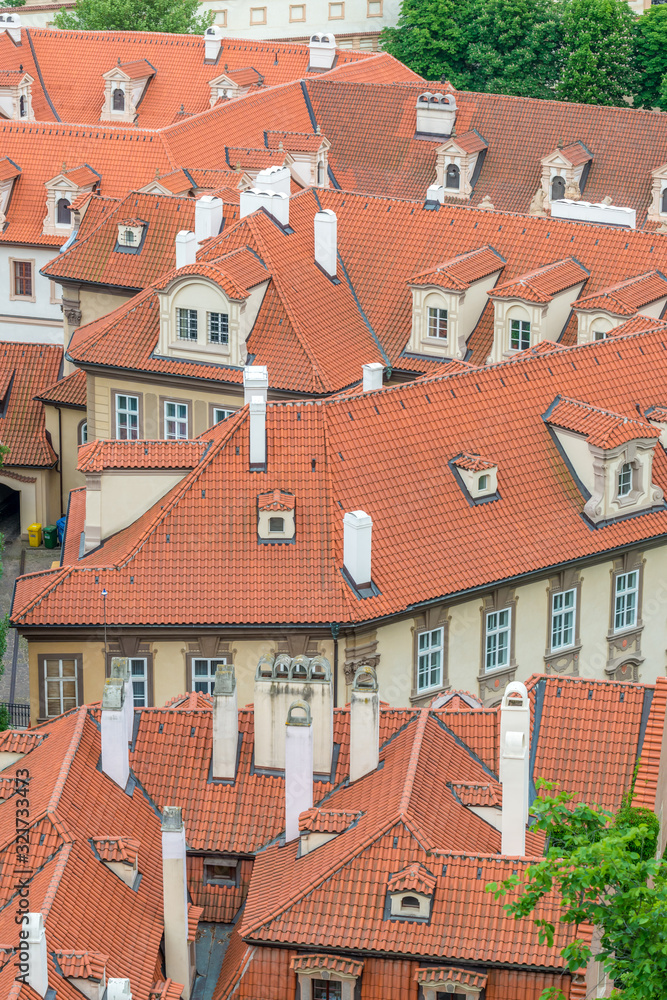 Top view to red roofs of Prague city Czech republic.