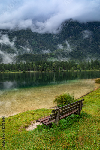 Bench by mountain lake Hintersee in Berchtesgaden national park, Deutschland