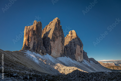 View to path of Tre Cime peaks at sunrise, Europe