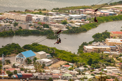Zip lining from the steepest zip line in the world on the island on Saint Maarten.