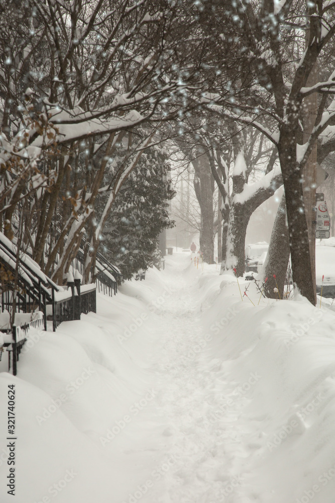 Sidewalk covered of snow in a street in Canada Sidewalk covered of snow in a street in Canada