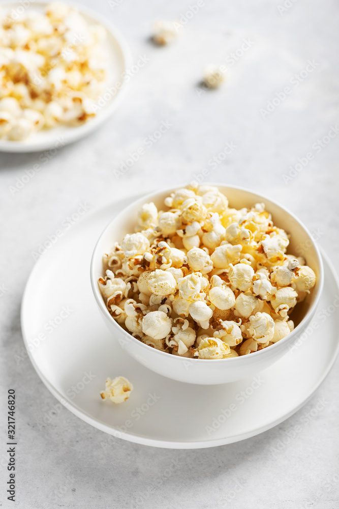 Salt popcorn in the light bowl Salt popcorn in the light bowl
