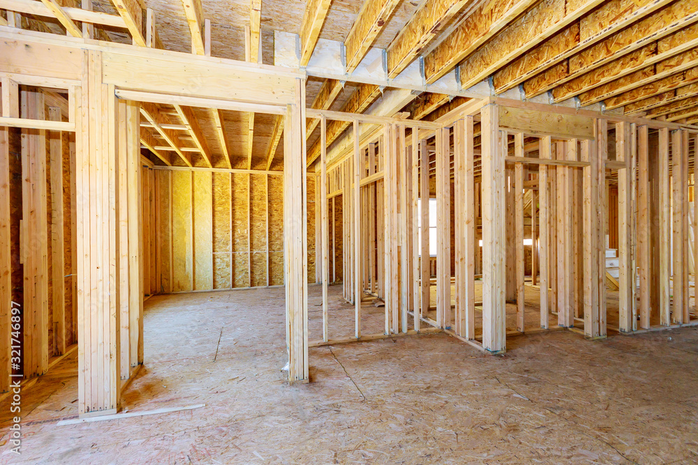 Home Framing unfinished wood frame building or a house Home Framing unfinished wood frame building or a house