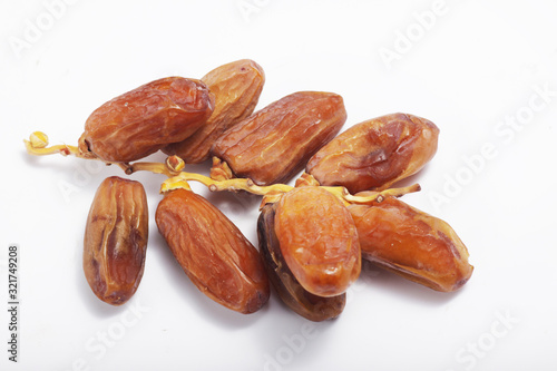 Macro shot of Tunisian dates / Phoenix dactylifera on a white isolated background