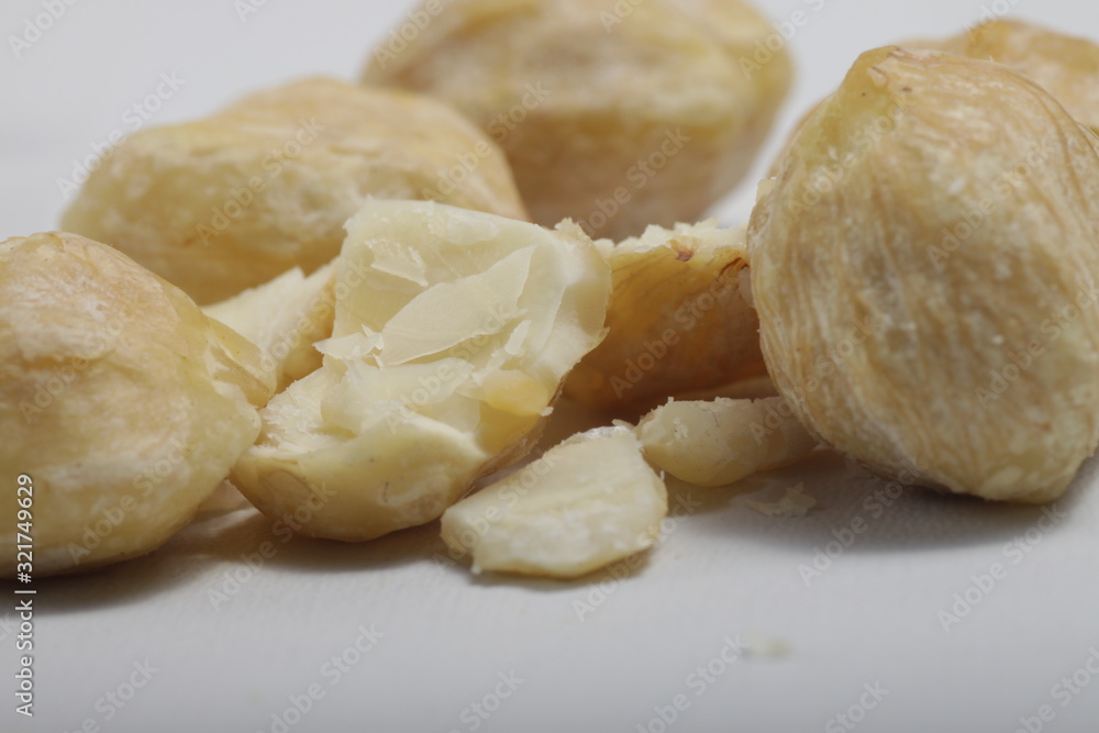 candlenut also known as kemiri at Indonesia, one of herbs that usually used for asian food as seasoning candlenut also known as kemiri at Indonesia, one of herbs that usually used for asian food as seasoning