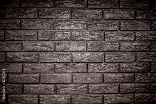 Natural black brick wall with space for text