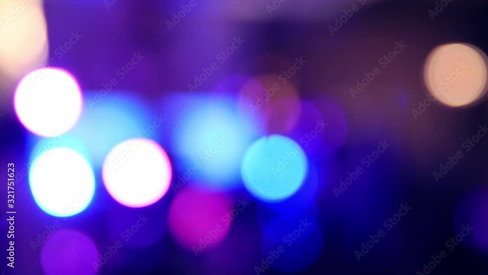 Blured night bokeh lights with cyan blue and magenta violet bright highlights Blured night bokeh lights with cyan blue and magenta violet bright highlights