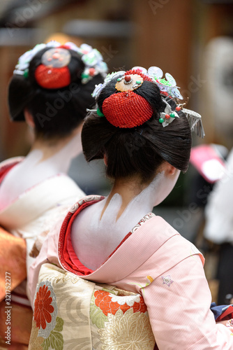 Photography Geisha or maiko in the streets of Kyoto in Japan