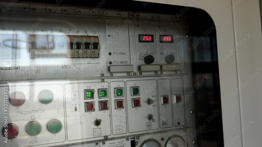 Close up view of Italian passenger train carriage light and climate controls in the moving train. Close up view of Italian passenger train carriage light and climate controls in the moving train.