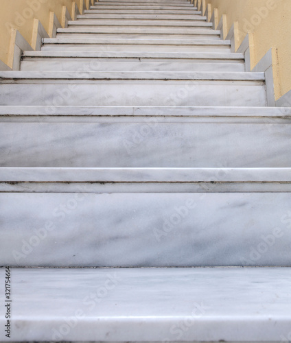 Marble staircase mixed with white and gray.
