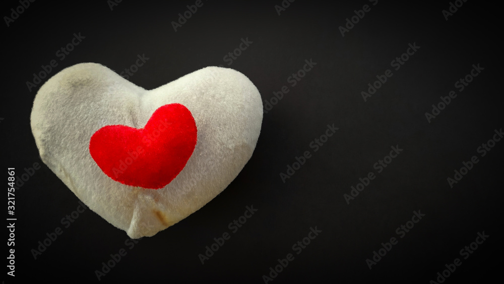 Fototapeta premium inspirational image of heart shape pillows in vintage background