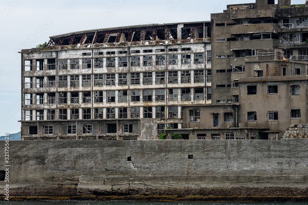 Ghost town on an abandoned island called Gunkanjima and also Hashima near Nagasaki Ghost town on an abandoned island called Gunkanjima and also Hashima near Nagasaki