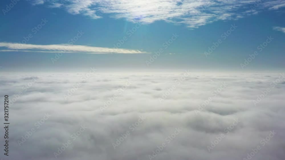 Morning flight over continuous clouds or morning fog. Morning flight over continuous clouds or morning fog.