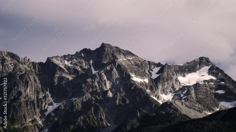 snowy mountain tops in the clouds. British Columbia, Canada. Pemberton Mountain snowy mountain tops in the clouds. British Columbia, Canada. Pemberton Mountain