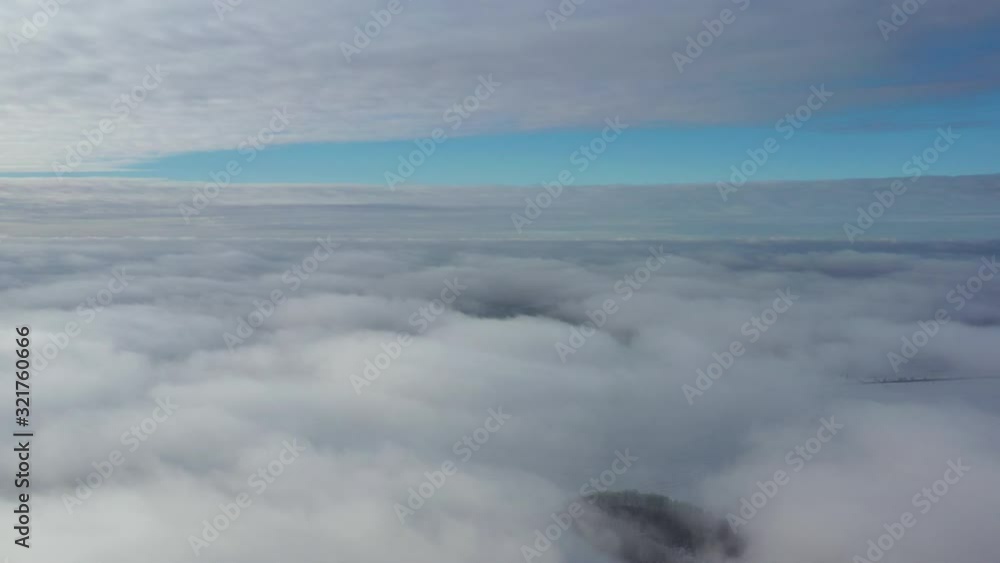 Morning flight over continuous clouds or morning fog. Morning flight over continuous clouds or morning fog.