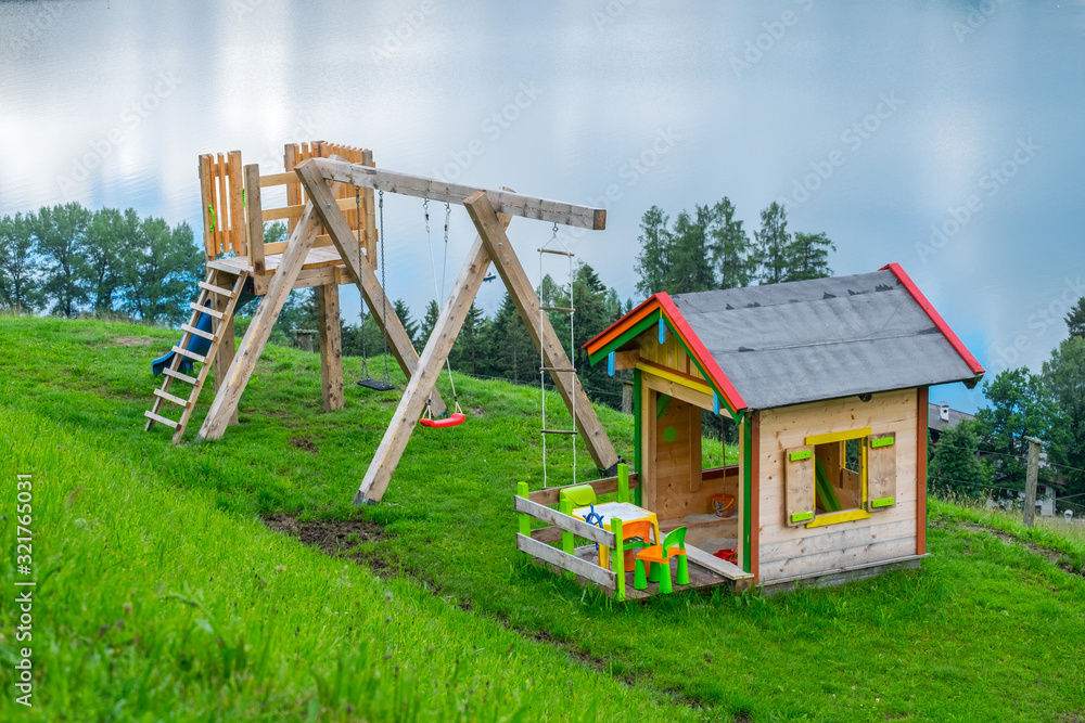 Colorful playground in highland landscape in austria Colorful playground in highland landscape in austria