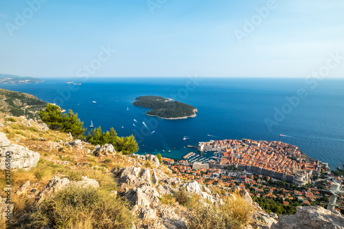 Fototapeta Naklejka Na Ścianę i Meble -  Aerial view of old city Dubrovnik in a beautiful summer day with blue sky