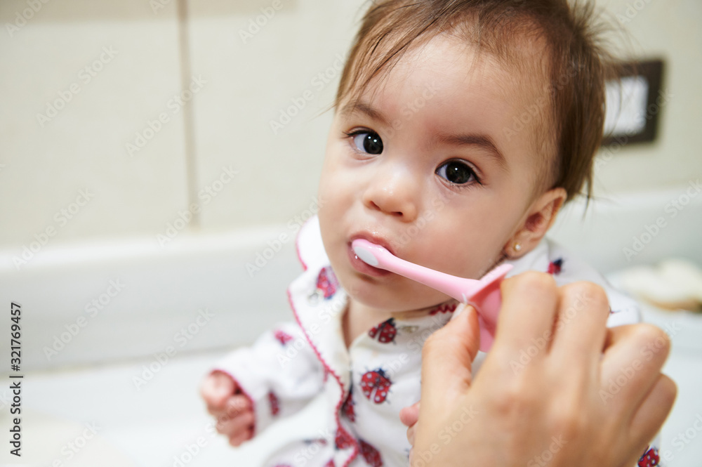 Cute little girl brushing her teeth Cute little girl brushing her teeth