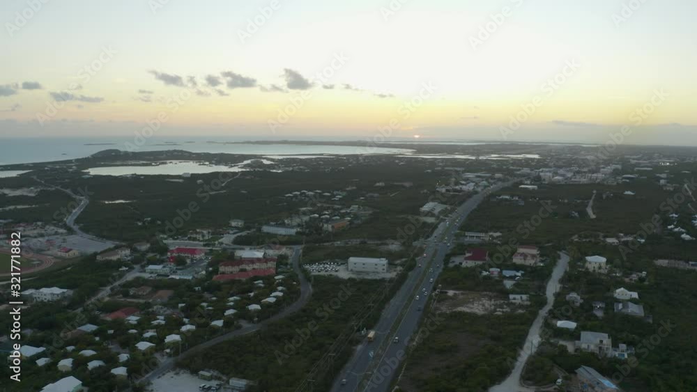 Grand Turk Island in the Turks and Caicos Archipelago at sunset. Wide angle aerial over the centre of the island Grand Turk Island in the Turks and Caicos Archipelago at sunset. Wide angle aerial over the centre of the island