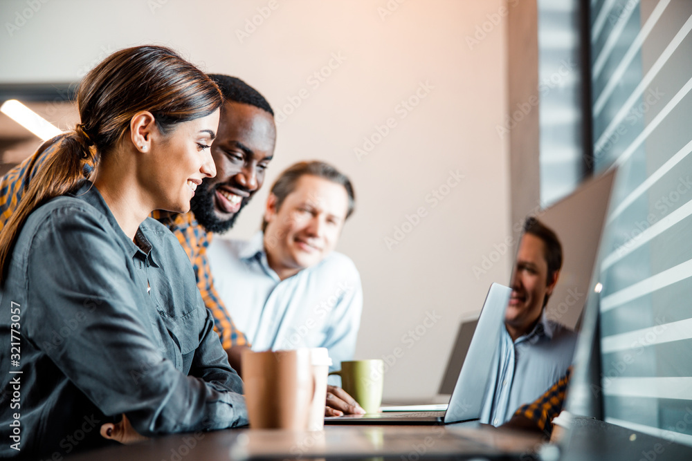 Positive delighted people staring at screen of laptop Positive delighted people staring at screen of laptop