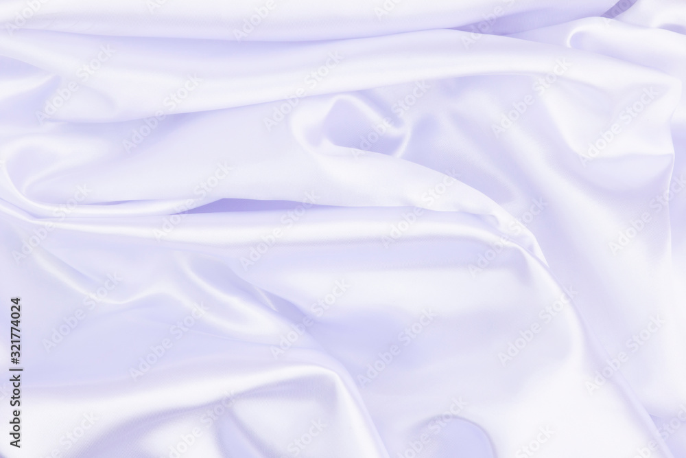 Fototapeta premium White wrinkled fabric with wrinkles and waves, background and Wallpaper of crumpled tissue.