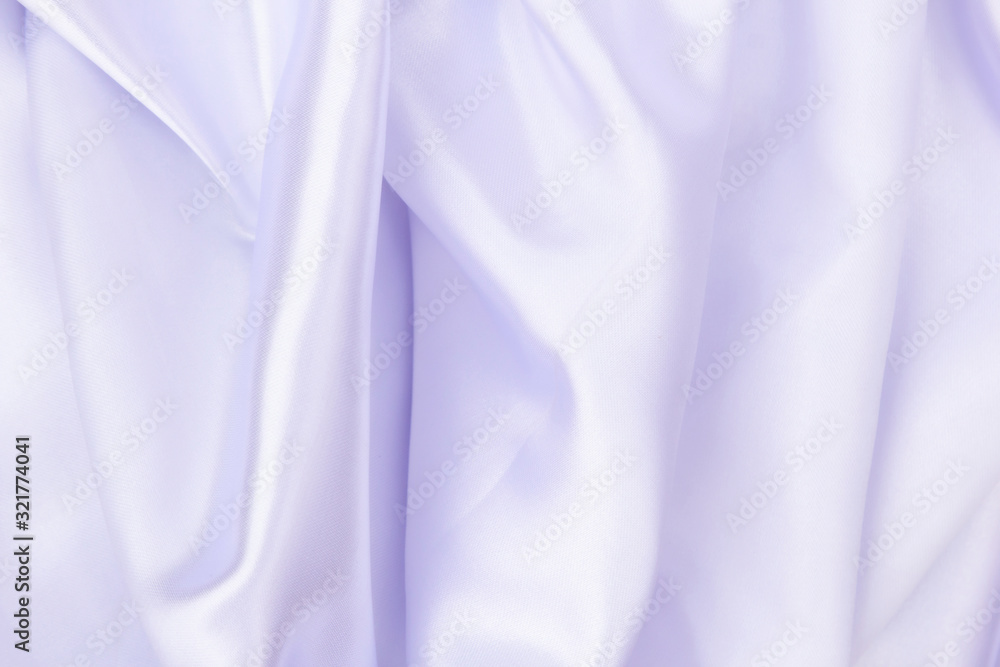 White wrinkled fabric with wrinkles and waves, background and Wallpaper of crumpled tissue. White wrinkled fabric with wrinkles and waves, background and Wallpaper of crumpled tissue.