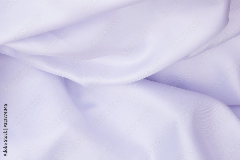 White wrinkled fabric with wrinkles and waves, background and Wallpaper of crumpled tissue. White wrinkled fabric with wrinkles and waves, background and Wallpaper of crumpled tissue.