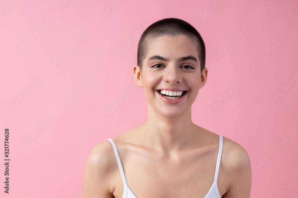 Portrait of happy young lady smiling with mouth open stock photo Portrait of happy young lady smiling with mouth open stock photo