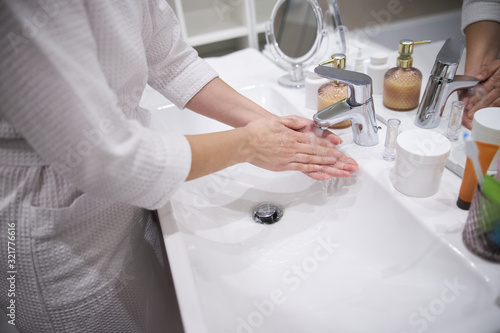 Hygienic procedure in the bathroom stock photo