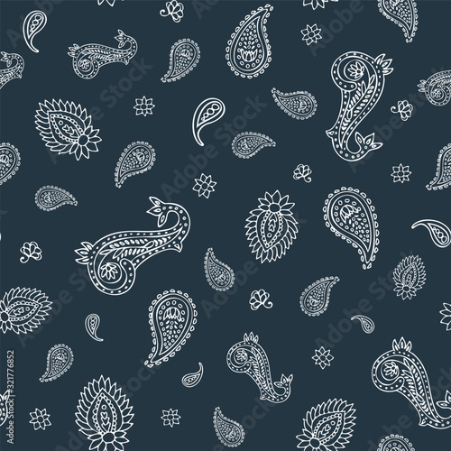 Paisley simple ethnic seamless vector pattern background in dark gray and white colors for fabric, wallpaper, scrapbooking projects or backgrounds.