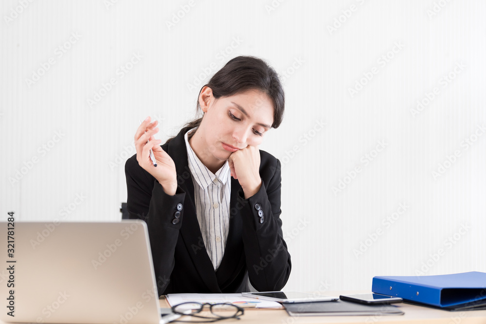 A businesswoman has concentrate working with and upset and unhappy. A businesswoman has concentrate working with and upset and unhappy.