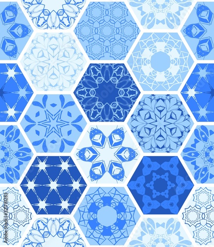 Hexagonal ceramic tile with ornament in blue colors. Seamless pattern.