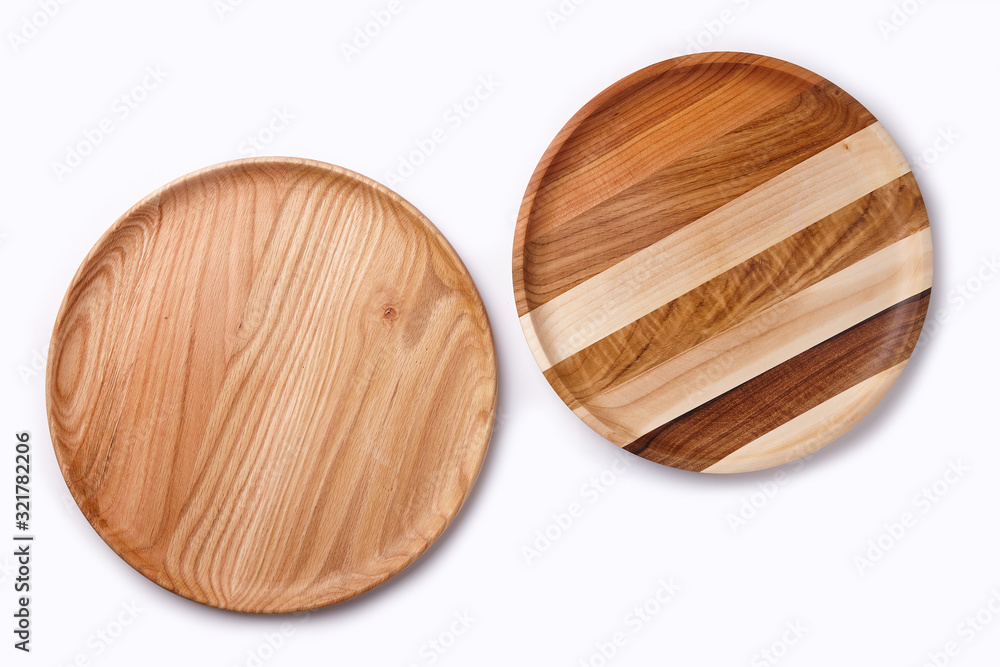 Wooden plates on a white background