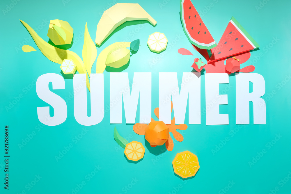 Different exotic fruits made of paper on trendy mint background Different exotic fruits made of paper on trendy mint background