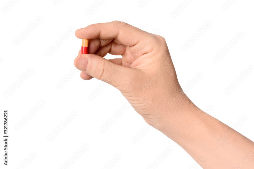 Medical drug in male hand isolated on white background