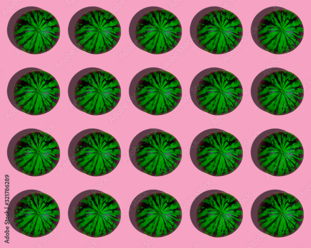 creative pattern with fresh ripe green watermelons with hard shadows creative pattern with fresh ripe green watermelons with hard shadows