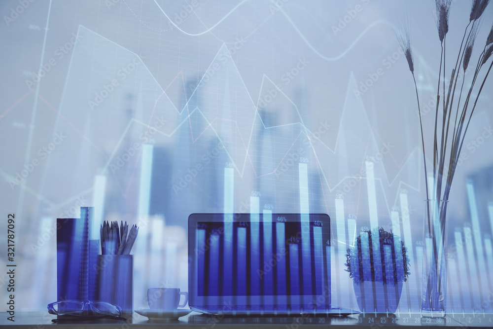 Forex Chart hologram on table with computer background. Multi exposure. Concept of financial markets.