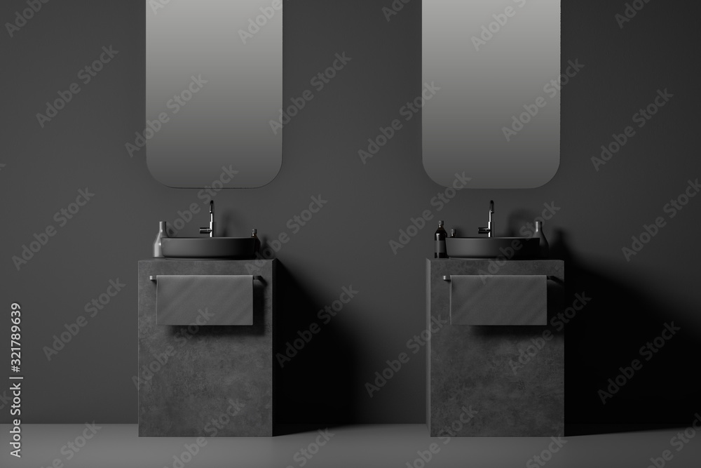 Round double sink in gray bathroom Round double sink in gray bathroom
