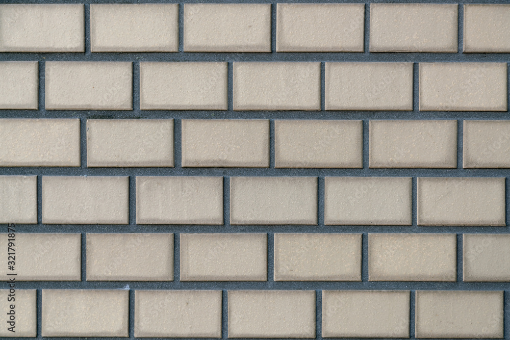 Obraz premium Cream brick wall pattern block background and texture