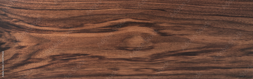 Texture of black walnut board with oil finish Texture of black walnut board with oil finish